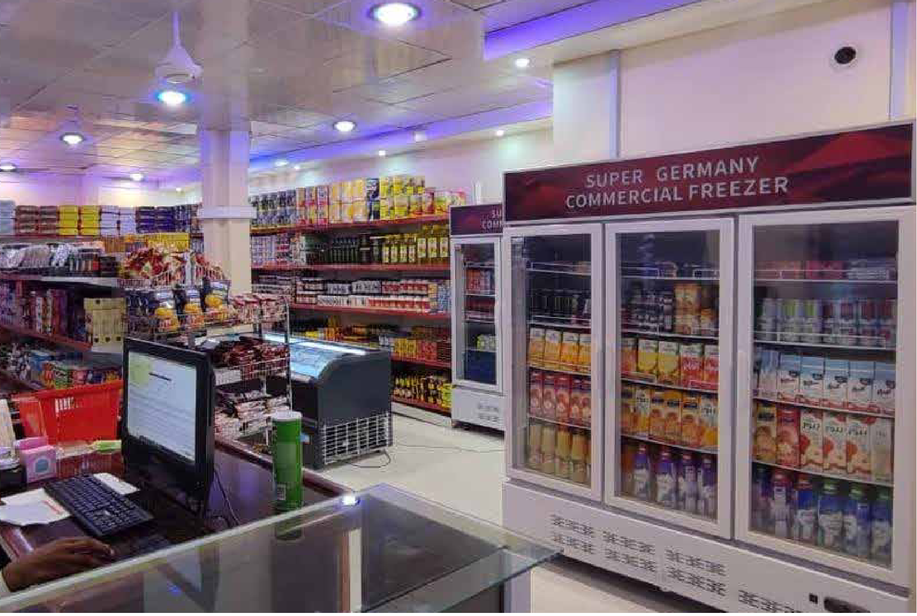 Interior of a Baraar supermarket showing well-stocked aisles